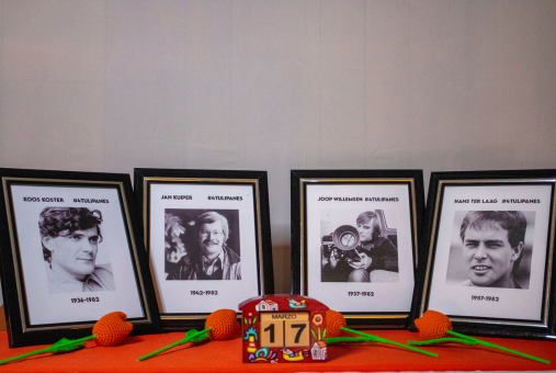 Four frames with photos of Dutch journalists